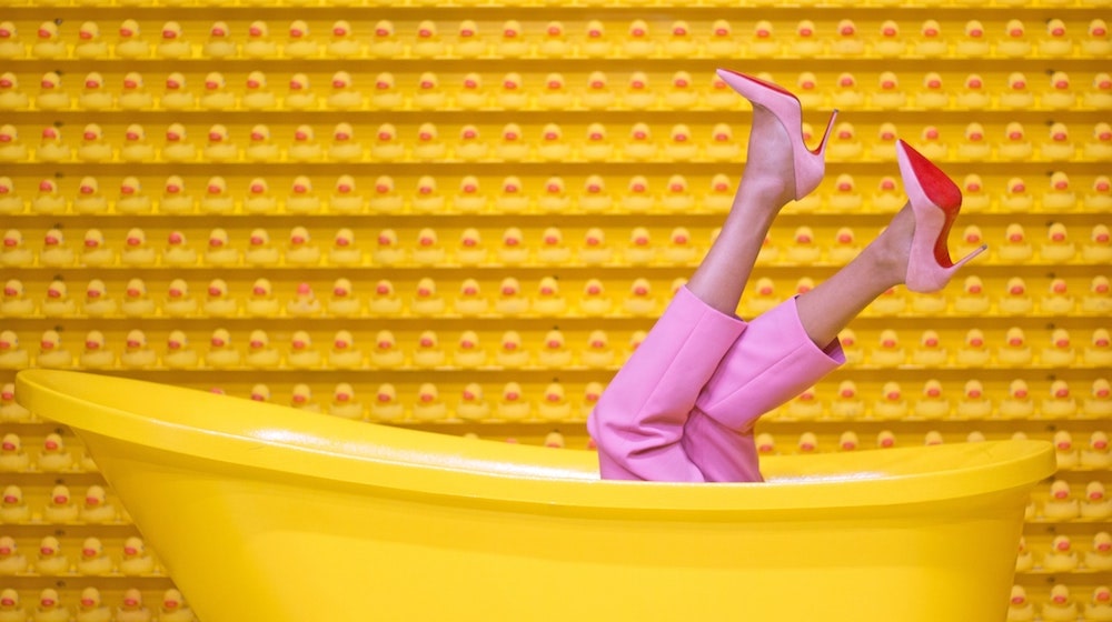 How To Start A Clothing Line Pink Pants and Shoes in Yellow Bathtub