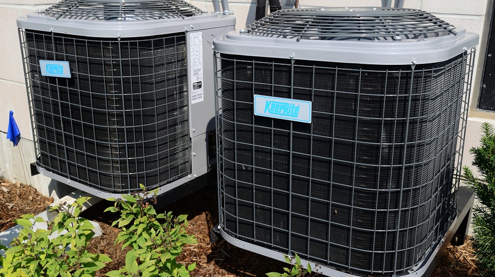 Two Air Conditioning Units In The Sun