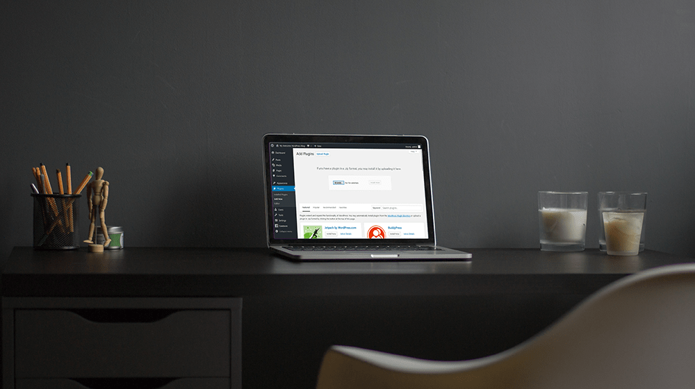 Laptop with WordPress on Desk Represents Speeding Up WordPress