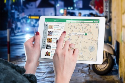 Map on Tablet Illustrates Local SEO Stats