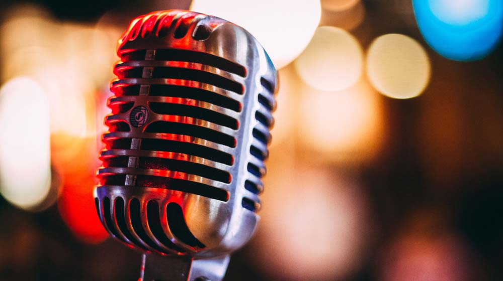 Microphone Illustrates GoDaddy Customer Feedback