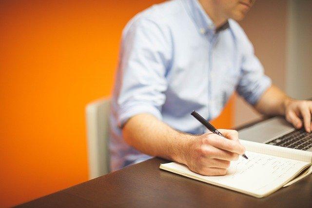 Mindfulness For Entrepreneurs Man Writing At Desk