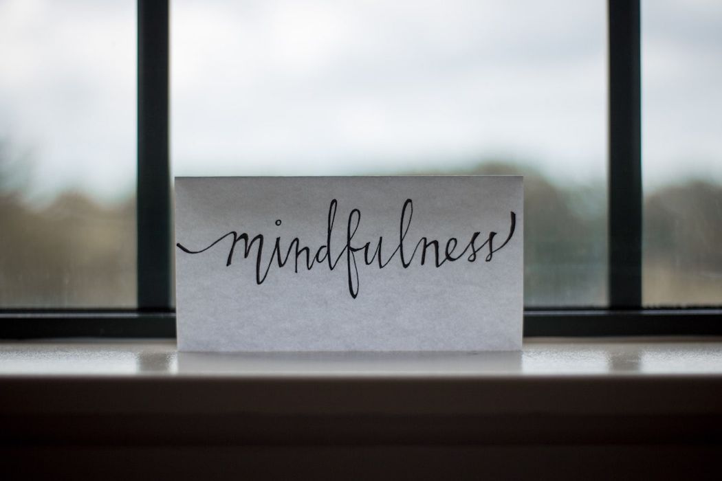 Mindfulness Printed on Paper in Window