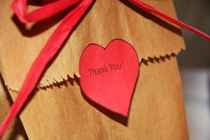 Paper Bag With A Bow And Thank You Message