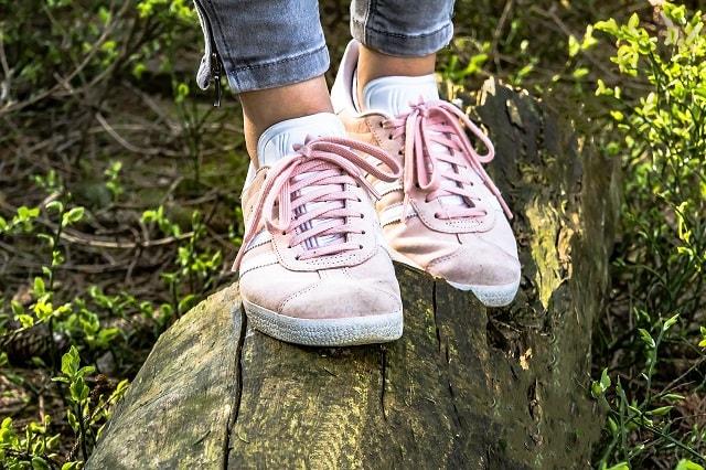 Girl Taking Steps Through Forest