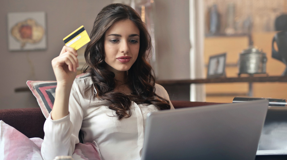 Woman holding a credit card