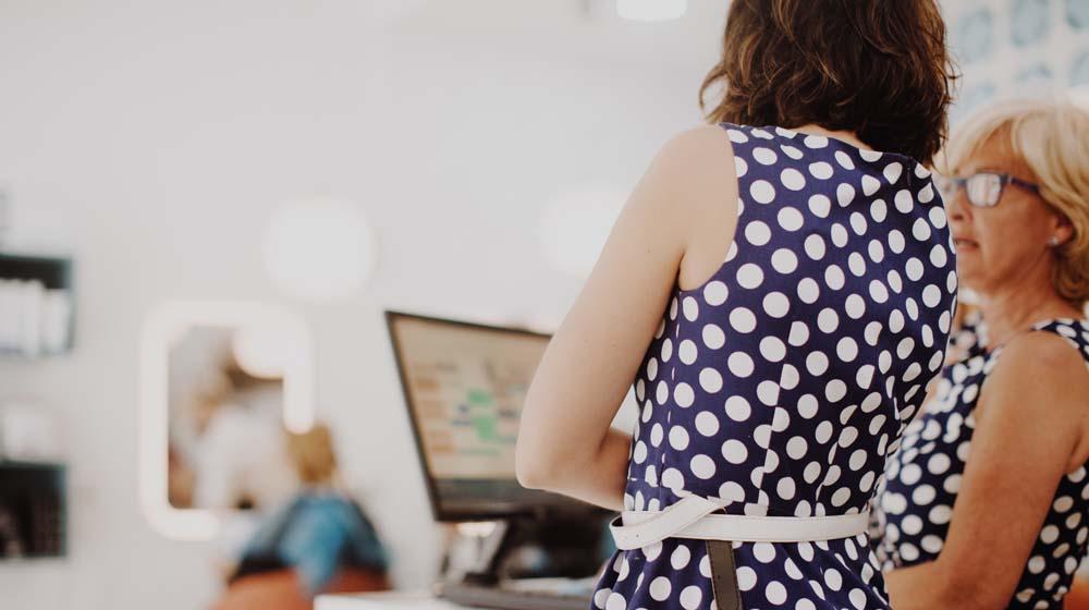 Online Scheduling Hair Salon Reception Area