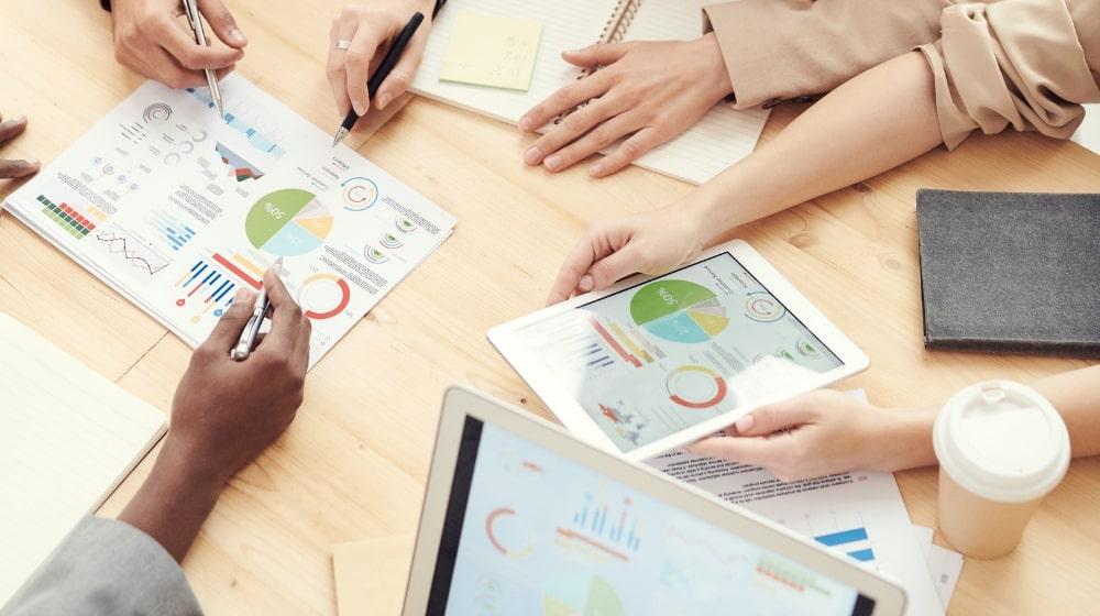 People Discussing Data Charts Illustrates Email Analytics