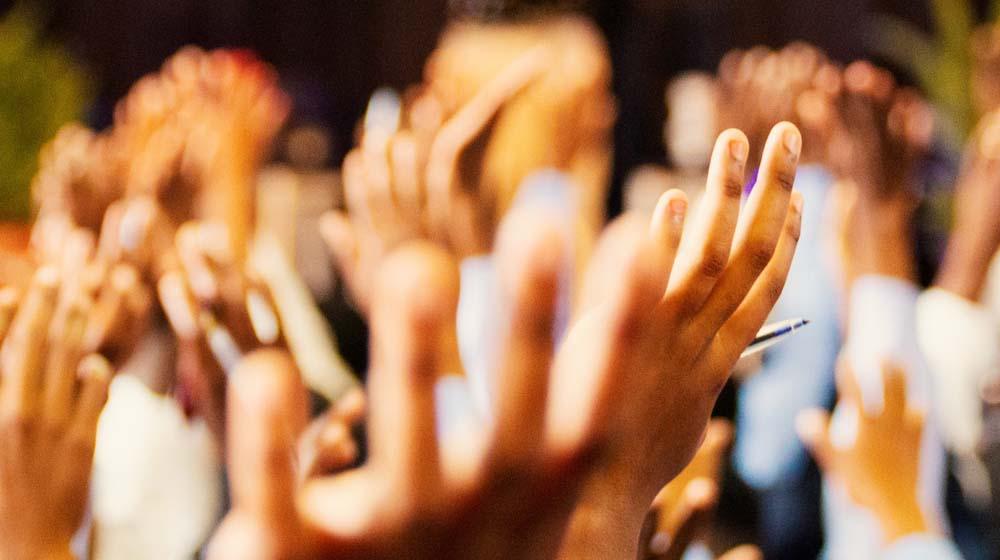 Raised Hands Represent Email Optins