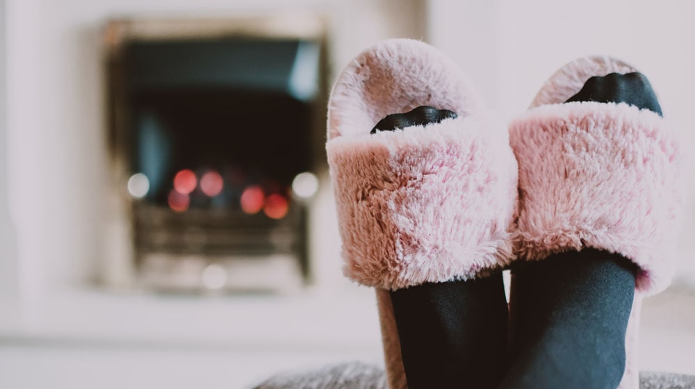 Slippered Feet Up Illustrates Passive Income Ideas