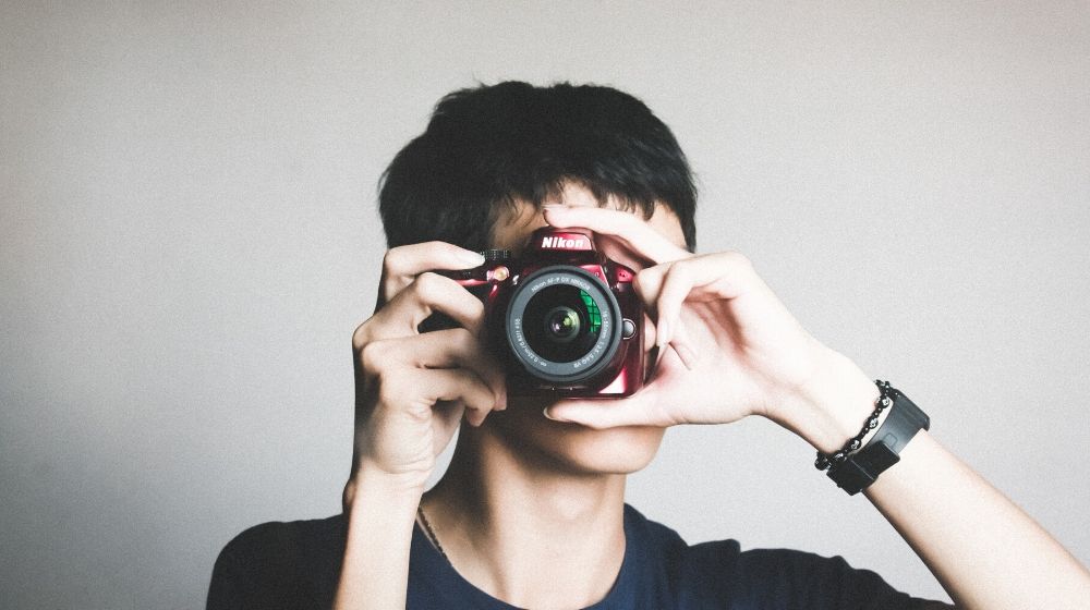 Person Taking A Photo To Illustrate Social Media Images