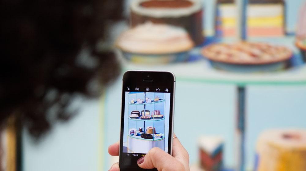 Taking Photo in Bakery Illustrates Tactics to Grow Social Media Following