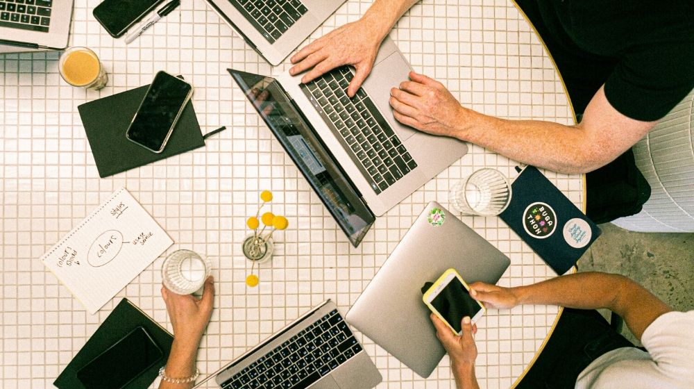 Task Management Software People Using Laptops