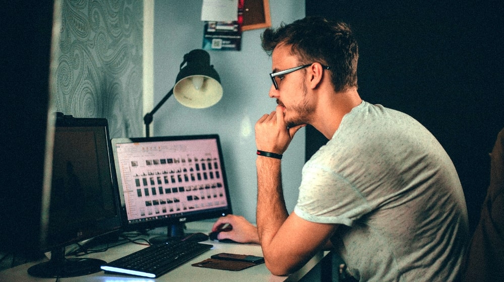 Image ALT: What Is Meta Description Guy Clicking Mouse At Computer