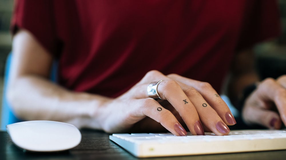 Woman Typing Keyboard Illustrates How To Start Service Business