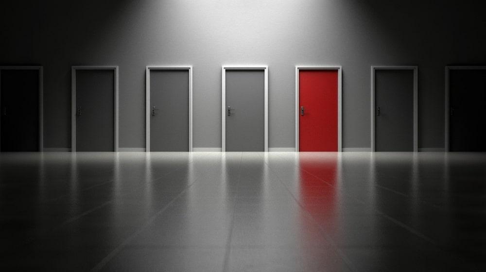 WordPress Page Builders Red Door Among Gray Doors